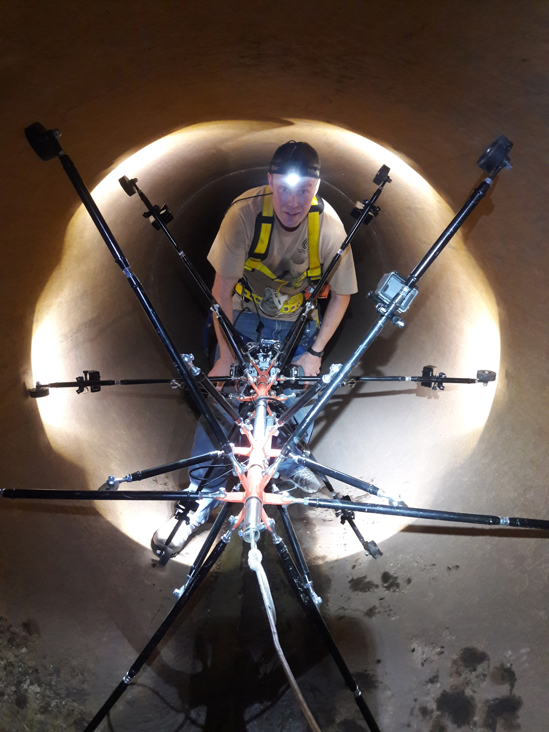 Employee analyzing pipe