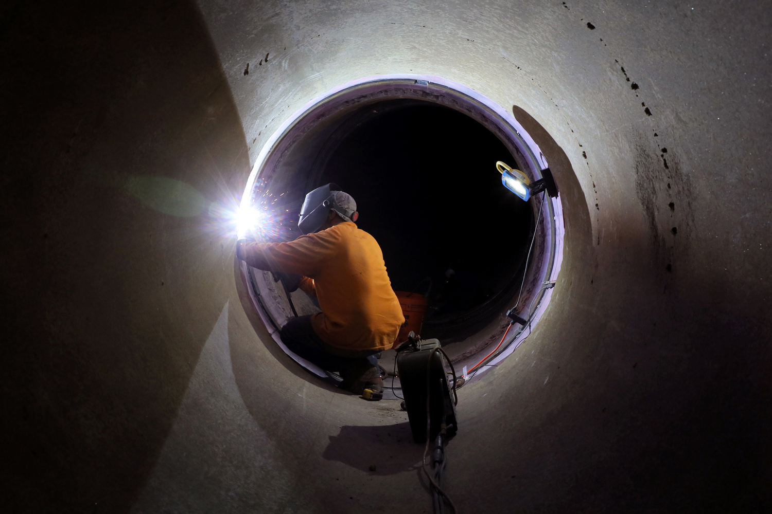 Man working in pipeline
